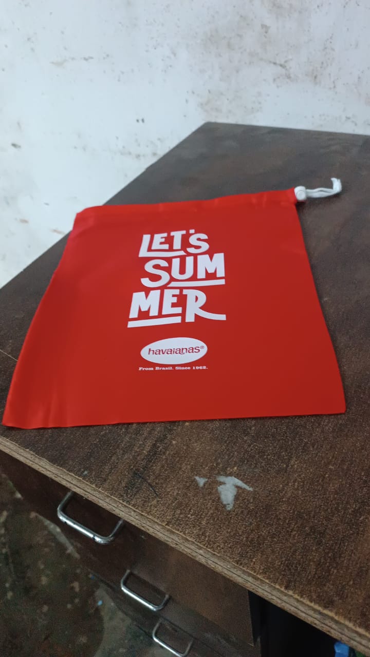 Wukusy heavy-duty drawstring bag for home improvement, made of durable material, shown with open drawstrings and spacious interior.