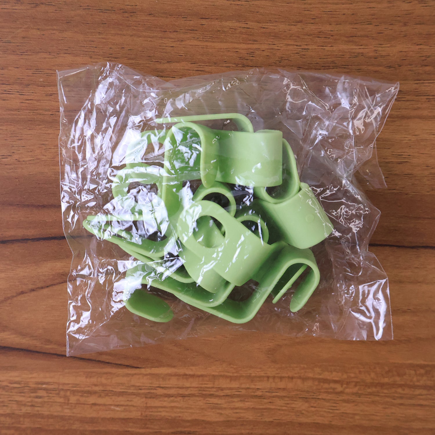 Set of 10 Wukusy plastic hanger hooks for versatile home improvement and organization purposes.