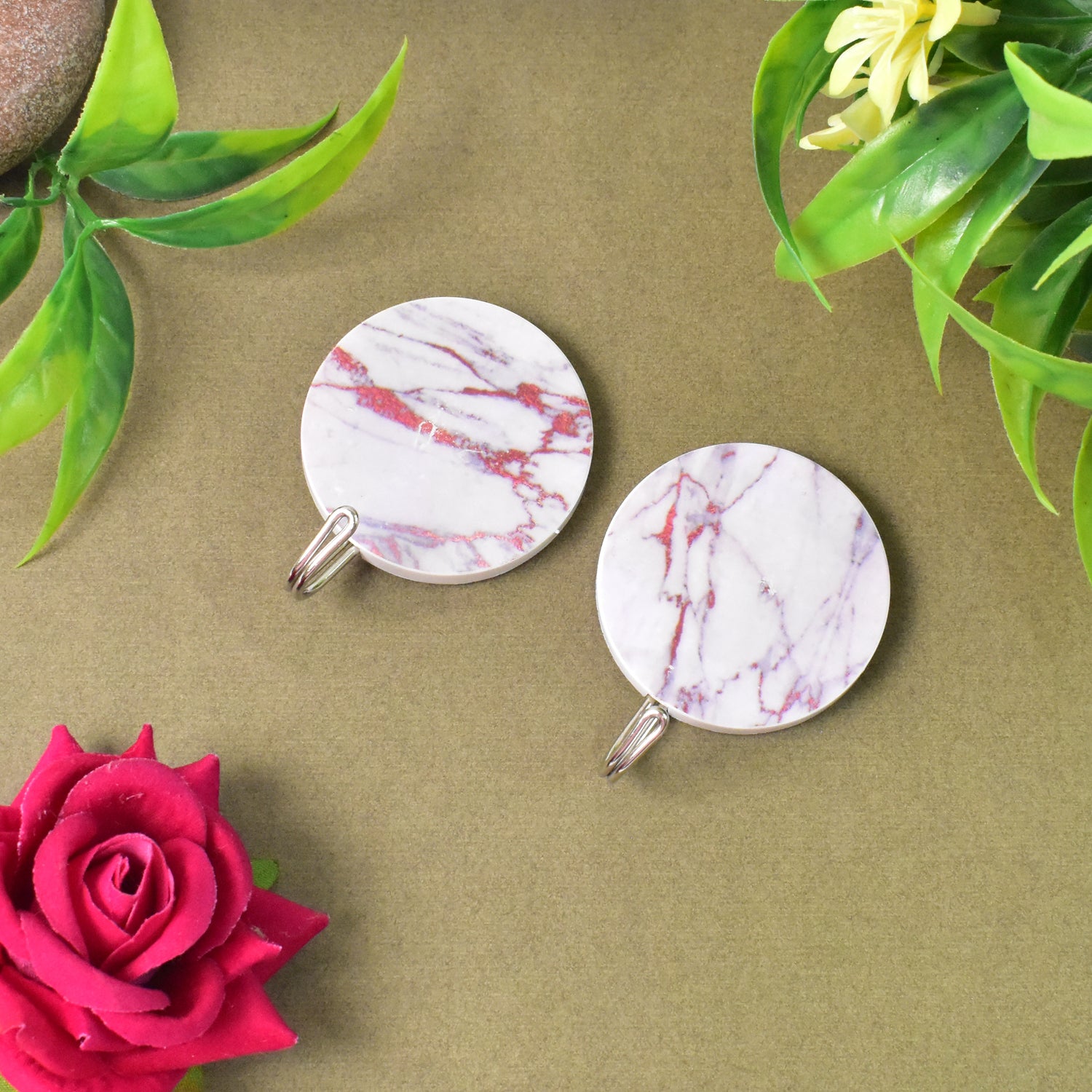 Wukusy 2-pack strong round self-adhesive hooks for home improvement, ideal for hanging items on walls or surfaces.