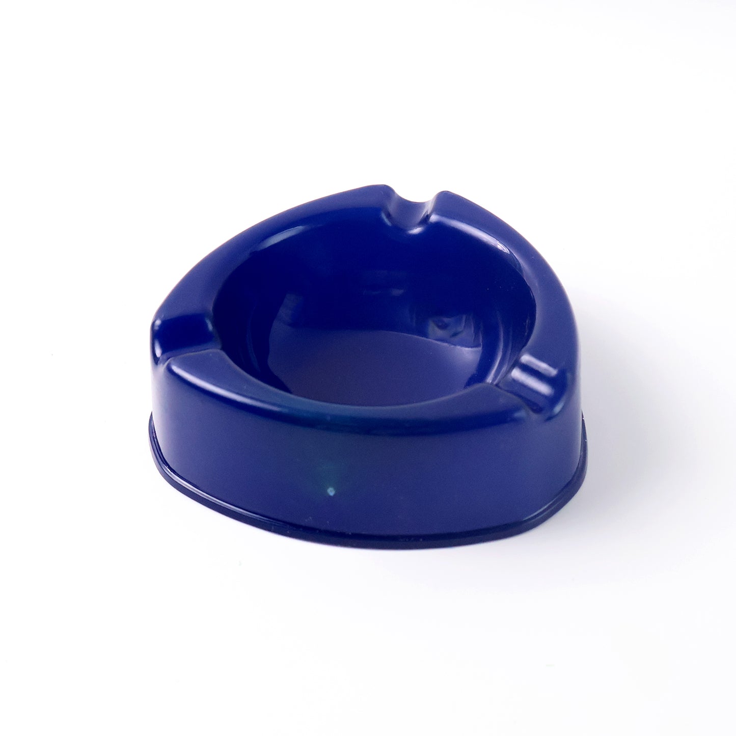Dark blue plastic ashtray by Wukusy, designed for home use, with a simple, durable plastic tray featuring a clean, modern look.