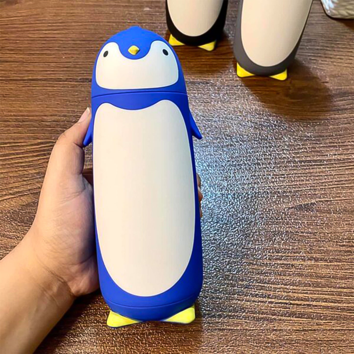 Wukusy penguin cartoon water bottle with insulated inner glass, vacuum-sealed travel mug, featuring a fun penguin design.