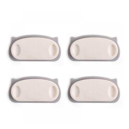 Wukusy pig-shaped wire plug organizer clips with self-adhesive pads, set of 4 for cable management and home improvement.