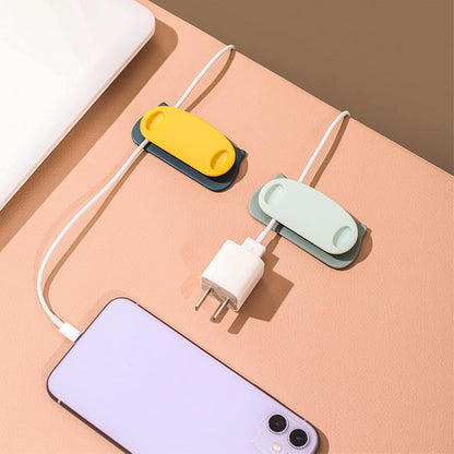 Wukusy pig-shaped wire organizer clips with self-adhesive pads, set of 4, for cable management and home improvement.