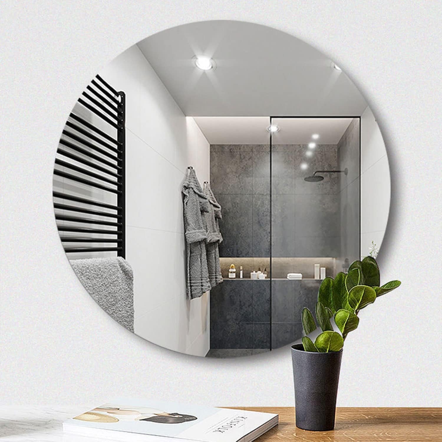 Plastic square 3D mirror wall sticker by Wukusy for home improvement, showing a reflective, geometric wall decor piece.