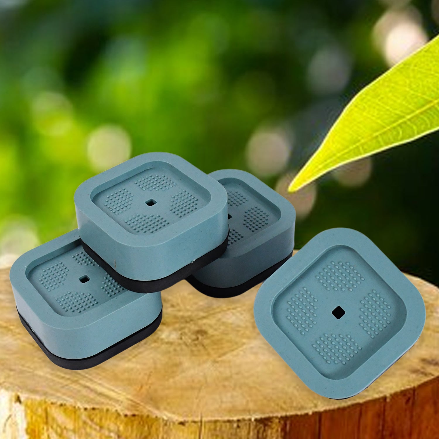 Set of four Wukusy plastic washing machine feet pads for home improvement, providing stability and protection for appliances.