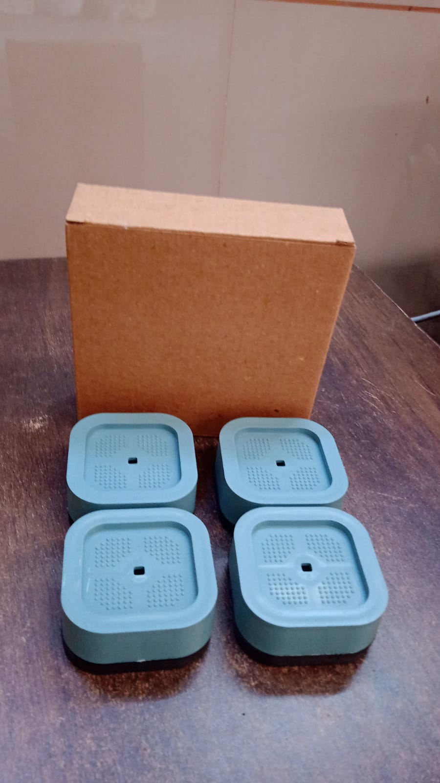Set of 4 Wukusy plastic washing machine feet pads for home improvement, designed to provide stability and protect floors.