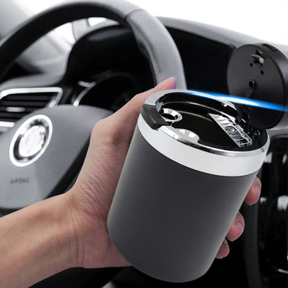 Wukusy portable car ashtray with lid and blue LED light, compact design for easy use in vehicles.