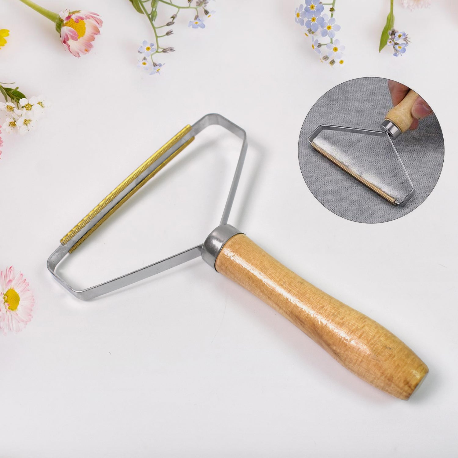 Wukusy portable double-sided lint remover for home improvement, showing the compact handheld tool with cleaning surfaces.