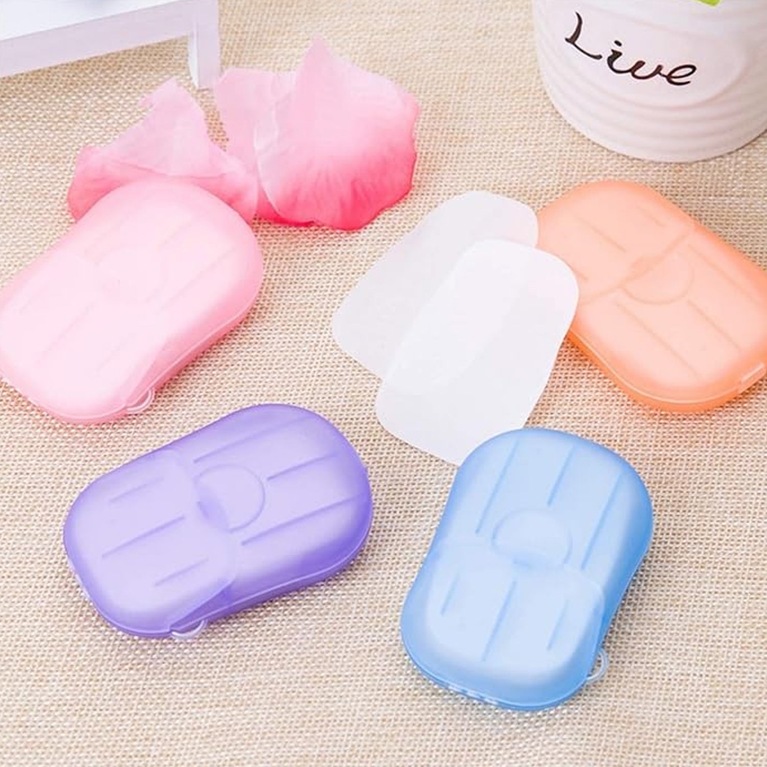 Wukusy portable travel paper soap sheets in a mini box, 20 mix-colored sheets for convenient hand cleaning on the go.