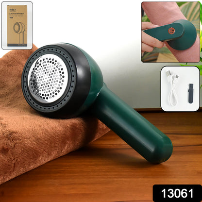 Wukusy portable lint remover with USB power cable, compact handheld lint remover for clothing and fabric cleaning.