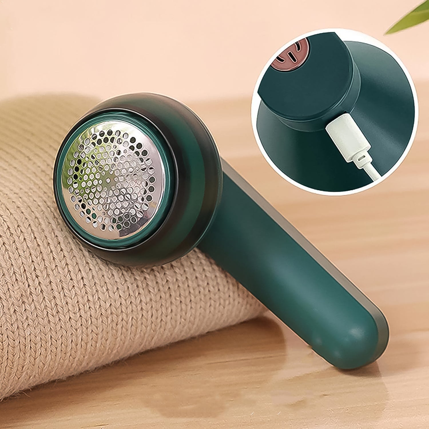 Wukusy portable lint remover with USB power cable, handheld fabric shaver for quick lint and fuzz removal from clothes.