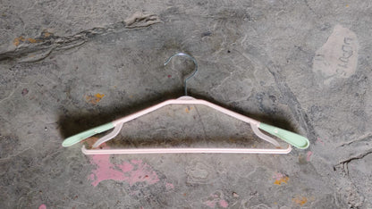 Wukusy PP cloth hanger with zinc-plated steel hook, single home improvement clothing hanger for closet organization.