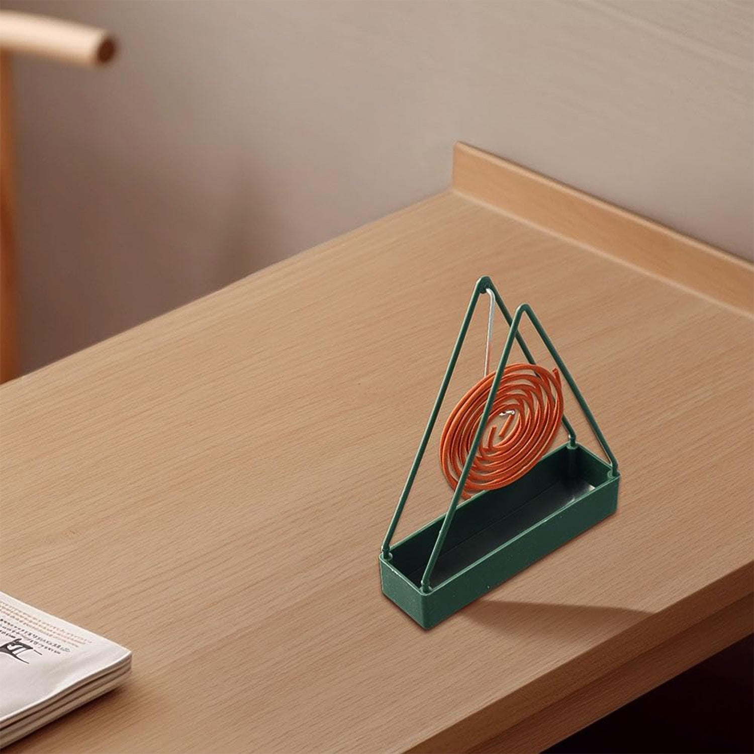 Wukusy premium plastic mosquito coil holder stand for home improvement, designed to safely hold and burn mosquito coils.