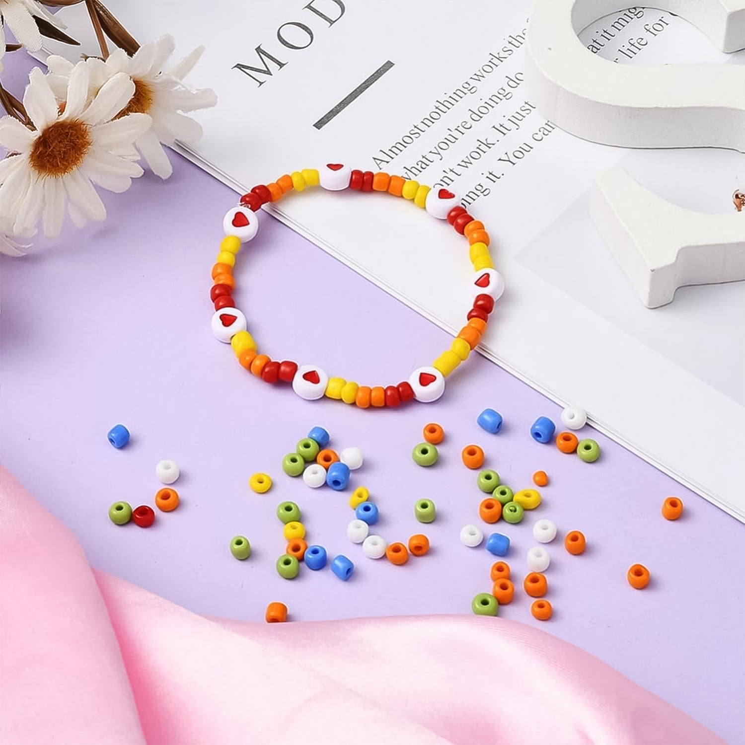 Wukusy Premium DIY bracelet making kit with colorful beads, cords, and tools for home jewelry crafting projects.