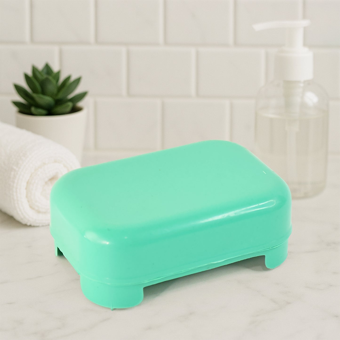 Aqua green rectangular plastic soap case by Wukusy, designed for soap storage, with a sleek, durable home improvement accessory.