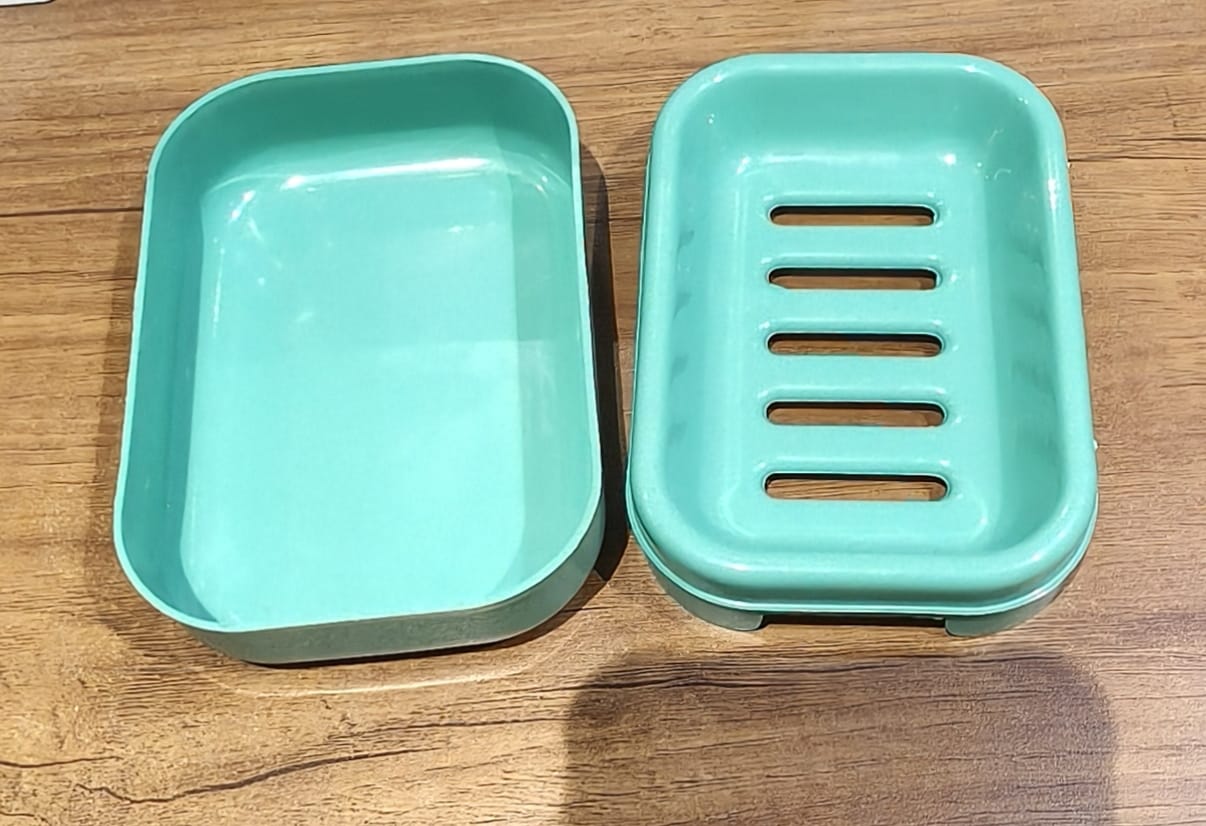Aqua green rectangular plastic soap case by Wukusy, ideal for home improvement, showcasing its sleek, durable design.