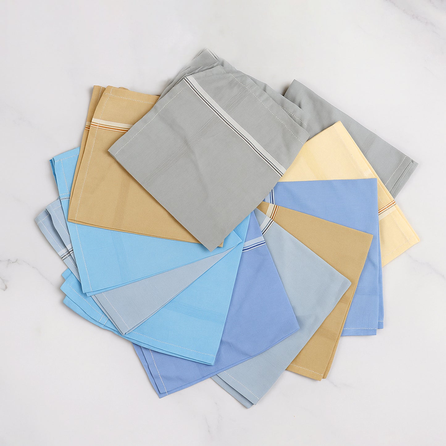 Soft cotton men's handkerchief by Wukusy, 40x40 cm, neatly folded on a clean surface, showcasing high-quality fabric.