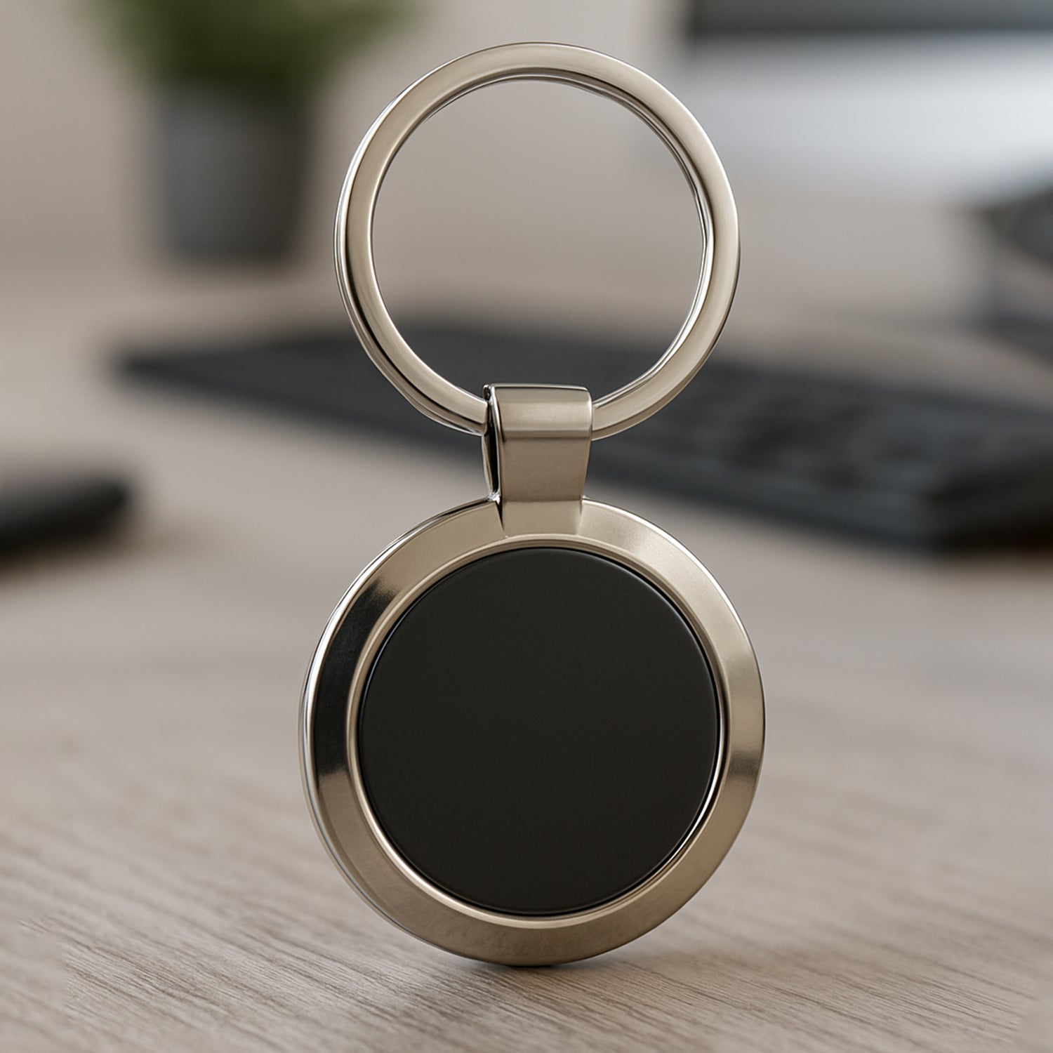 Wukusy premium round metal keychain, home improvement accessory, showcasing a sleek circular design on a plain background.
