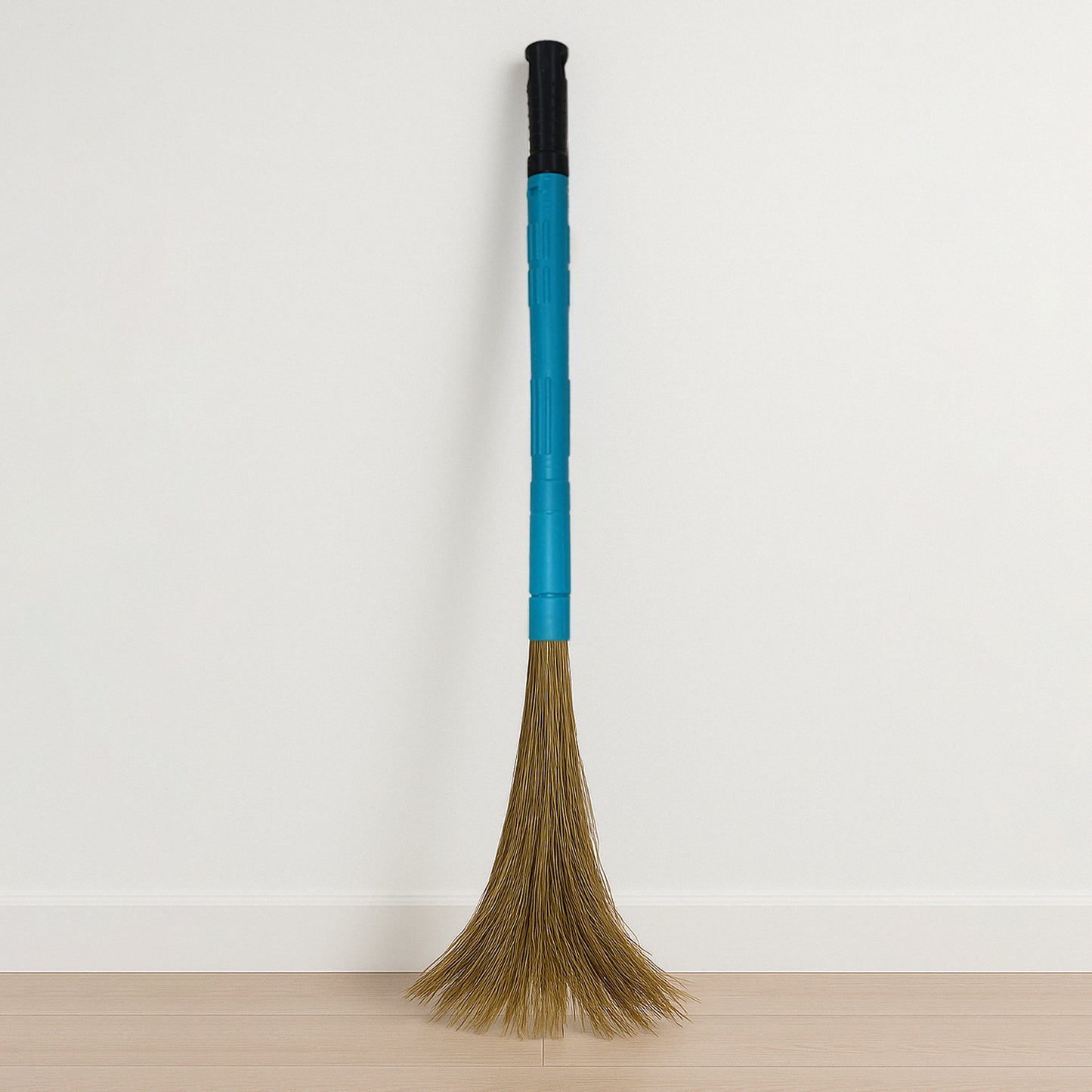 Wukusy Pro Clean expandable floor broom with plastic handle for home improvement, showing the broom's extendable design and sturdy handle.