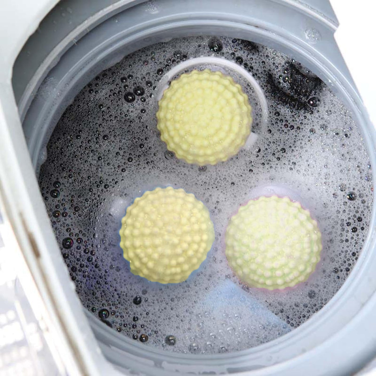 Wukusy reusable cylindrical lint mesh bag for washing machines, designed to prevent lint buildup, in a home improvement setting.