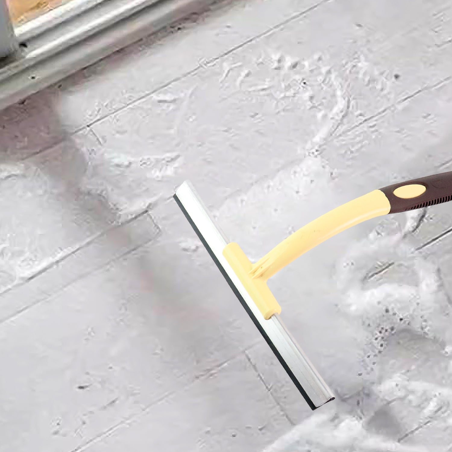 Wukusy Ritu Premium Window Glass Wiper for home improvement, with a sleek handle and rubber blade for cleaning windows.