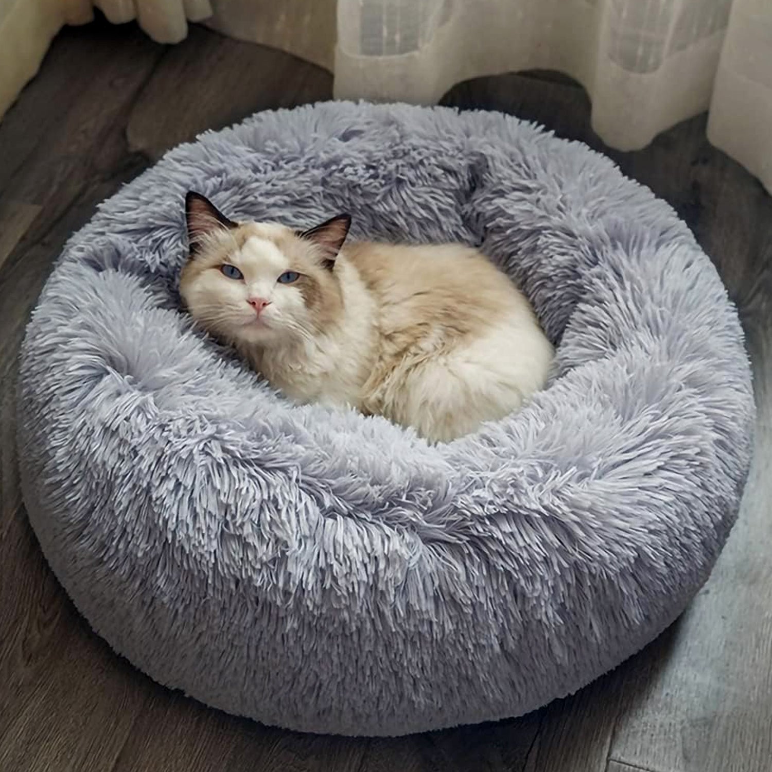 Wukusy round dog bed for small and medium dogs and cats, cozy plush pet bed with soft cushioning for home comfort