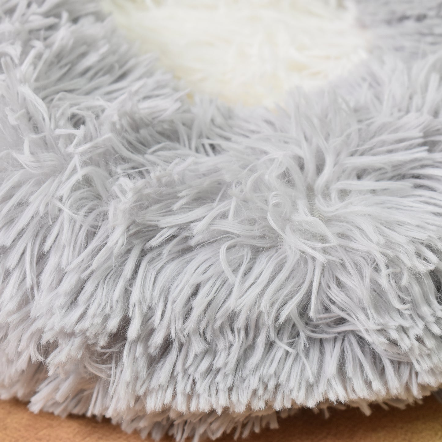 Round Wukusy dog bed for small and medium dogs and cats, soft and cozy pet bed in a neutral color for home comfort.