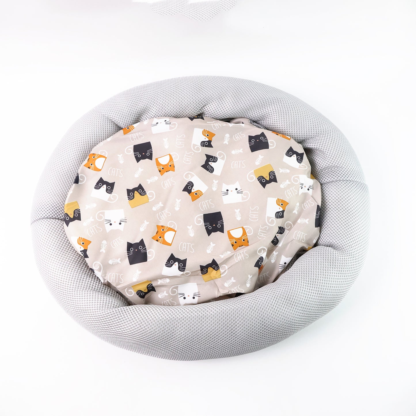 Round plush cat bed with cartoon cat print cushion, soft and comfortable for pets, by Wukusy.