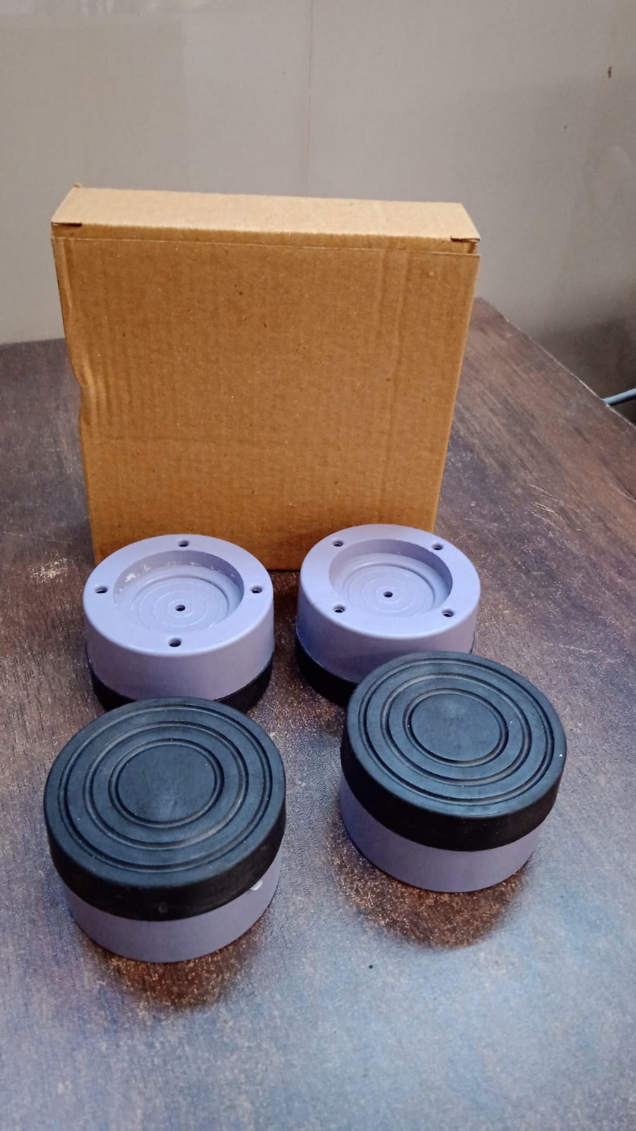 Set of four Wukusy round washing machine support pads for stable placement and vibration reduction in home improvement projects.