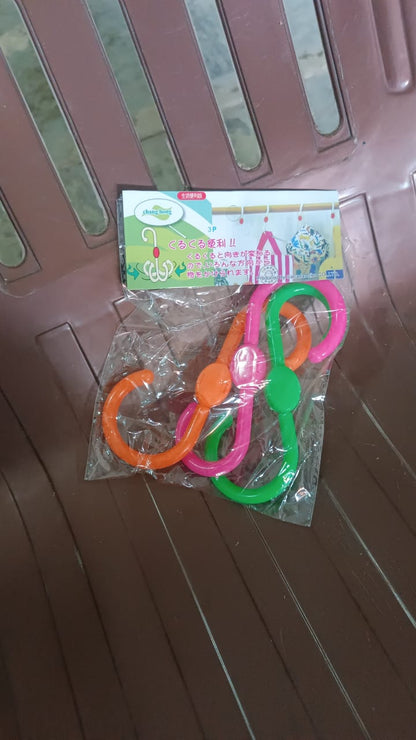 Set of three Wukusy S-shape plastic hooks for hanging clothes, ideal for home organization and wardrobe storage.