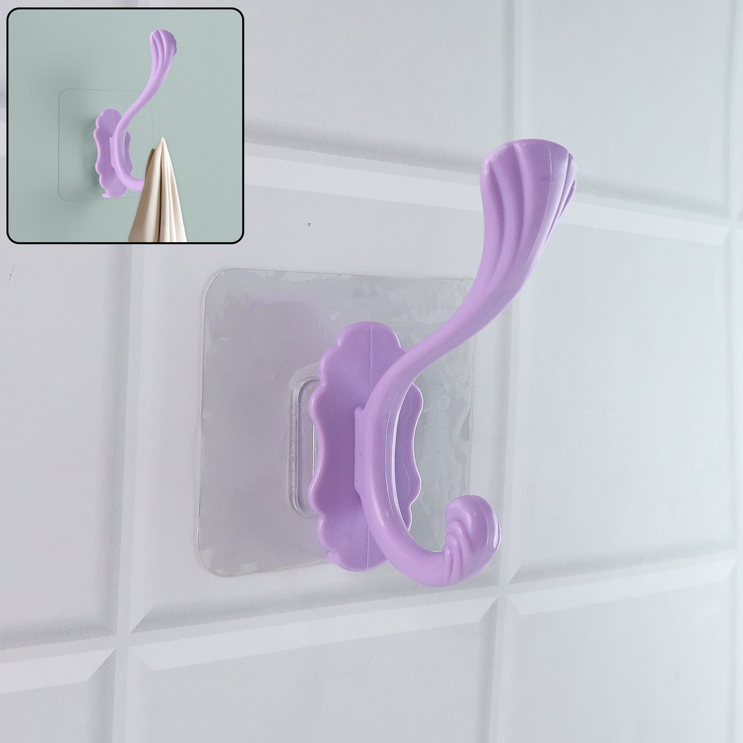 Wukusy self-adhesive heavy-duty decorative wall hook mounted on a wall, ideal for home improvement and hanging items.