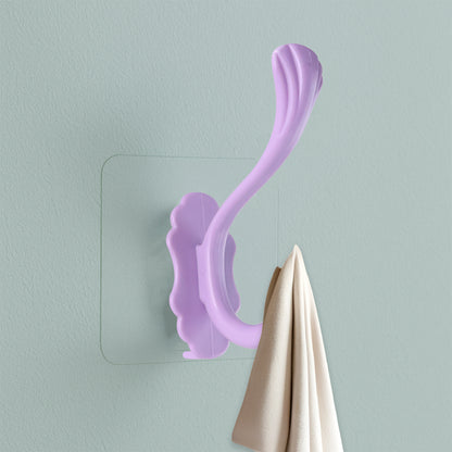 Wukusy heavy-duty self-adhesive decorative wall hook for home improvement, showing the sturdy hook attached to a wall surface.