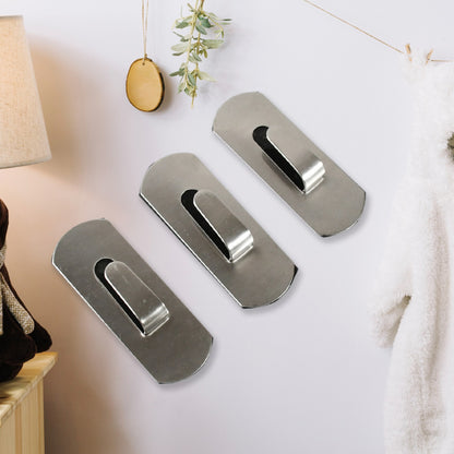 Wukusy stainless steel self-adhesive heavy-duty wall hooks for hanging robes, coats, towels, and kitchen or bathroom accessories.