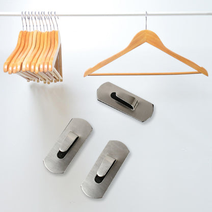 Stainless steel Wukusy heavy-duty self-adhesive wall hooks for hanging robes, coats, towels, and kitchen or bathroom essentials.