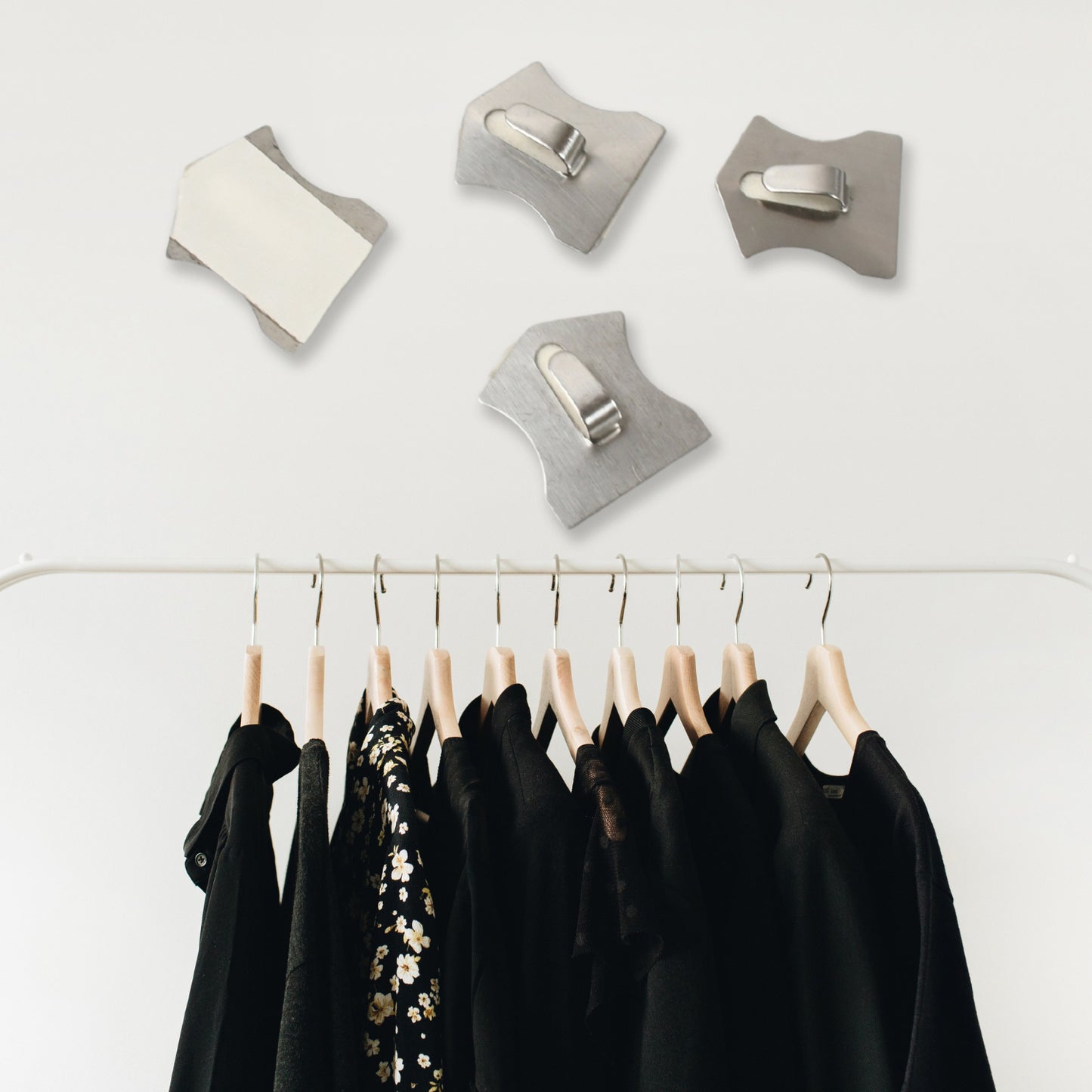 Stainless steel Wukusy heavy-duty self-adhesive wall hooks for hanging robes, coats, towels in kitchen, bathroom, or home.