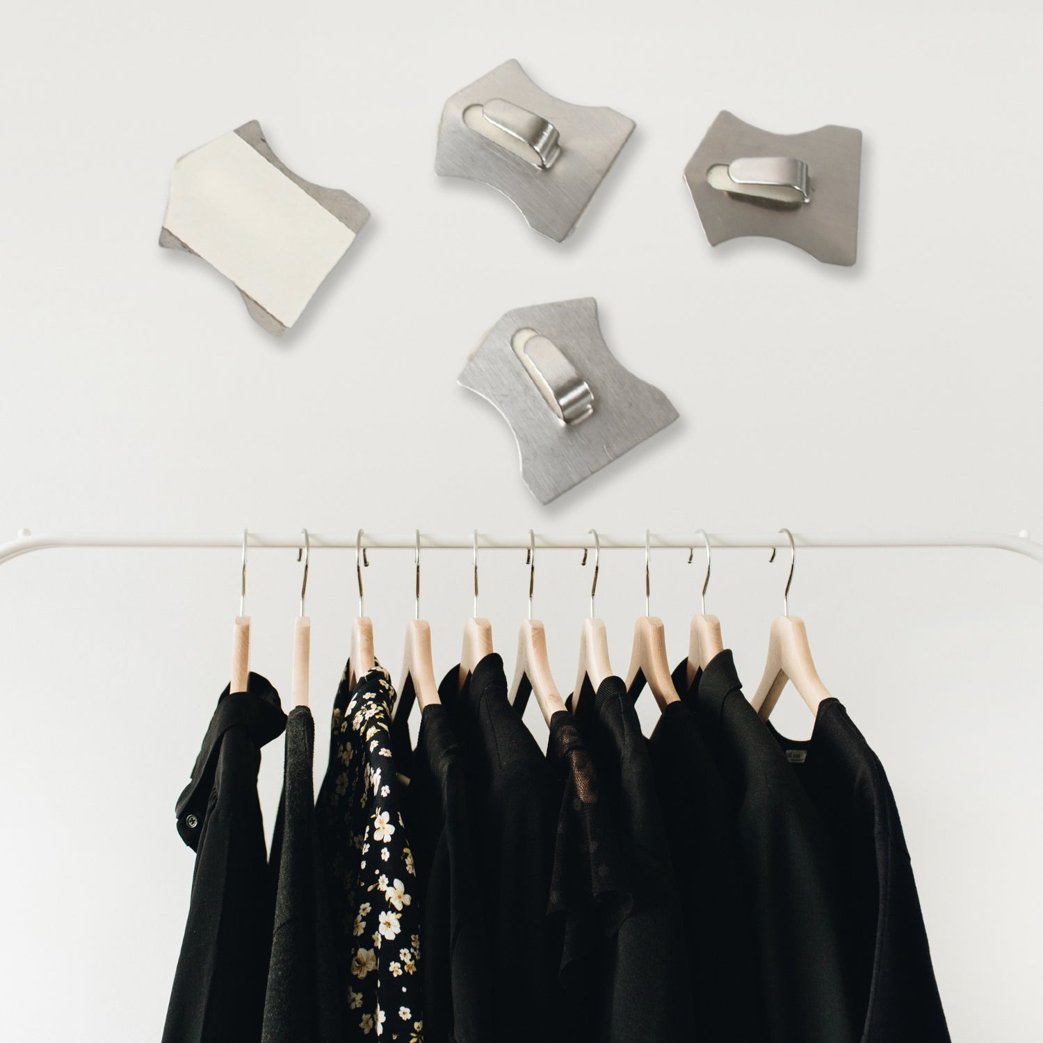 Stainless steel Wukusy heavy-duty self-adhesive wall hooks for hanging robes, coats, towels in kitchen, bathroom, or home.