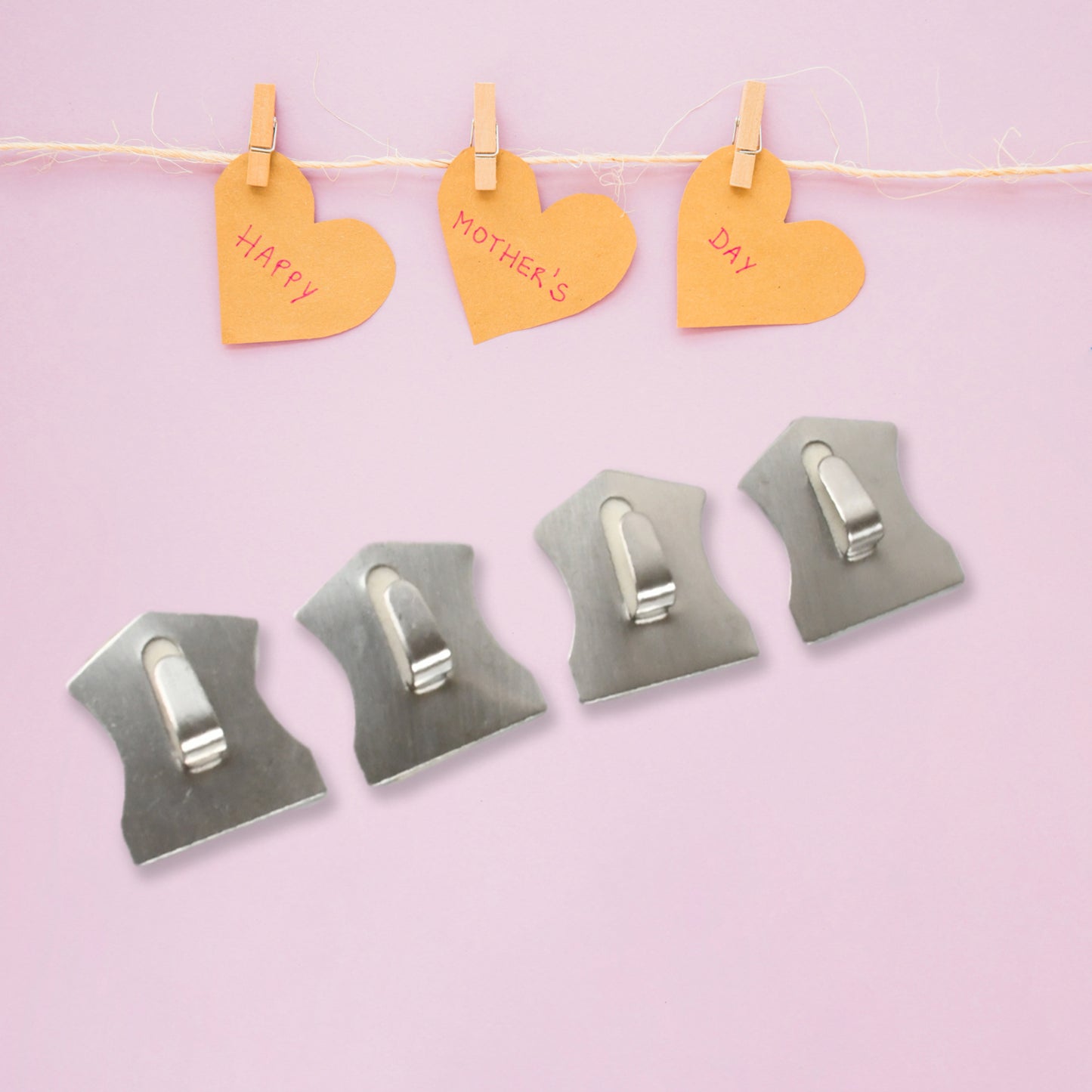 Stainless steel Wukusy heavy-duty self-adhesive wall hooks for hanging robes, towels, coats, and kitchen or bathroom accessories.