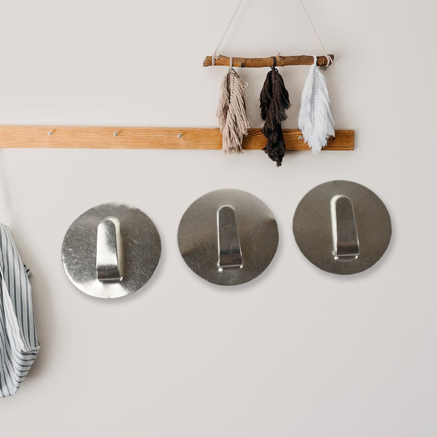 Stainless steel Wukusy self-adhesive heavy-duty wall hooks for hanging robes, towels, coats, and kitchen or bathroom accessories.