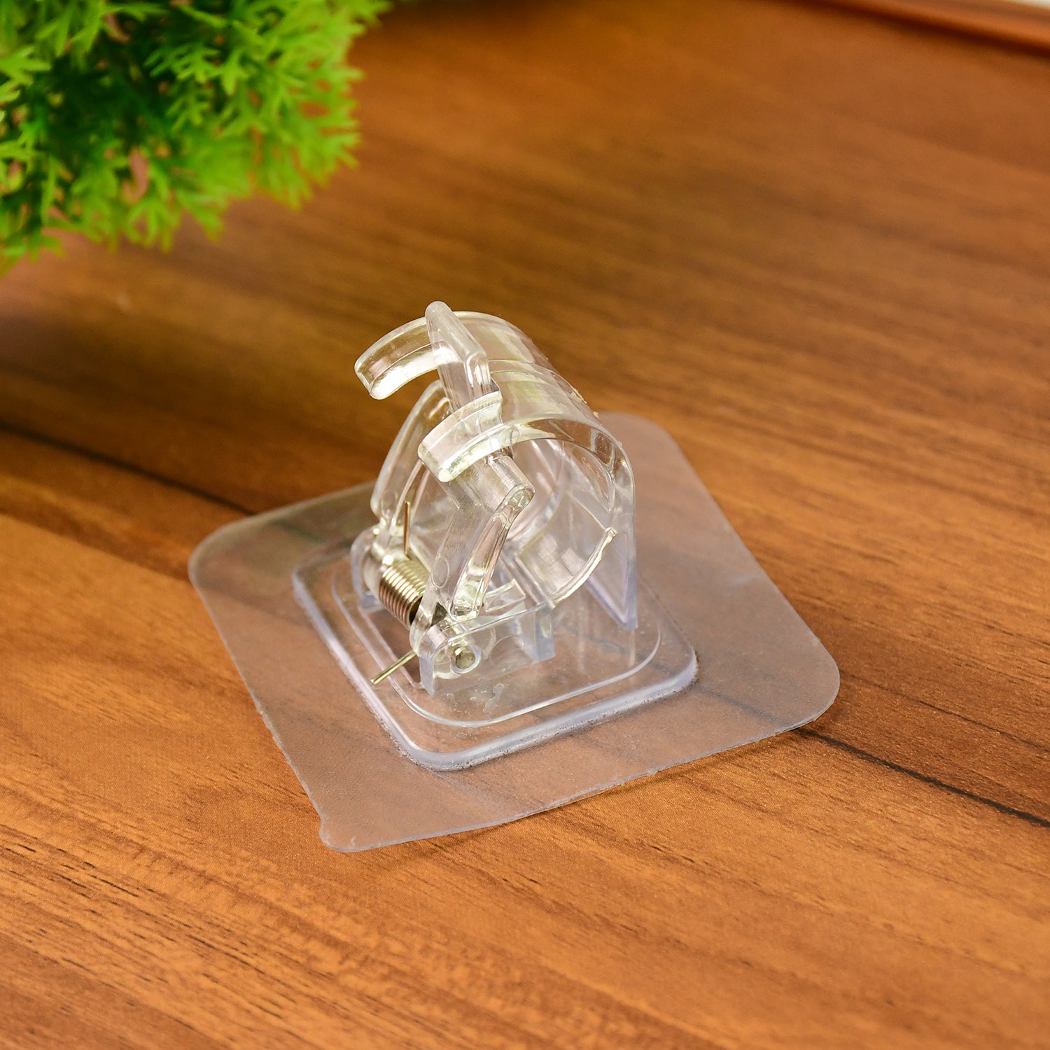 Wukusy self-adhesive transparent wall with spring-loaded anti-slip clip for home improvement, shown with clip attached to a surface.