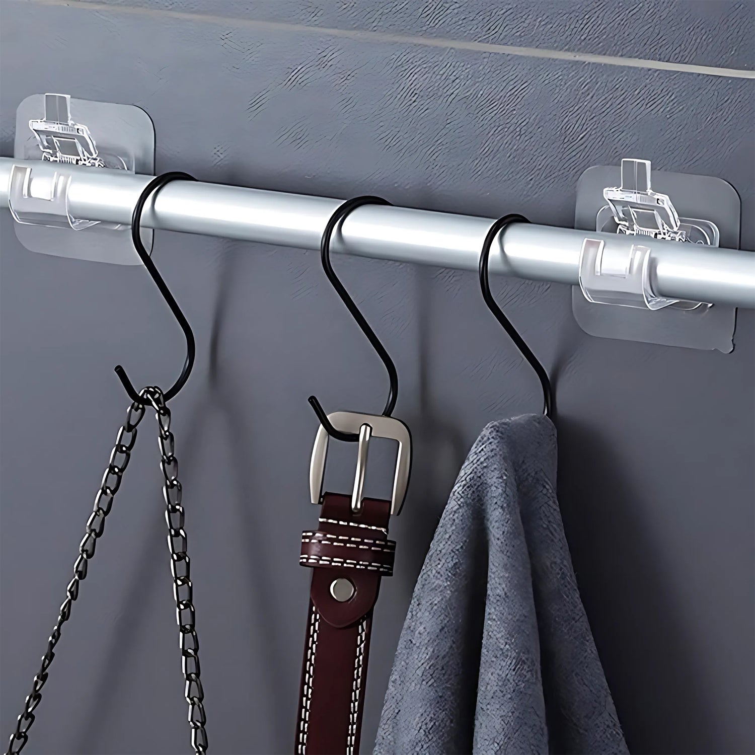 Wukusy self-adhesive transparent wall with spring-loaded anti-slip clip for home improvement, shown attached to a surface.