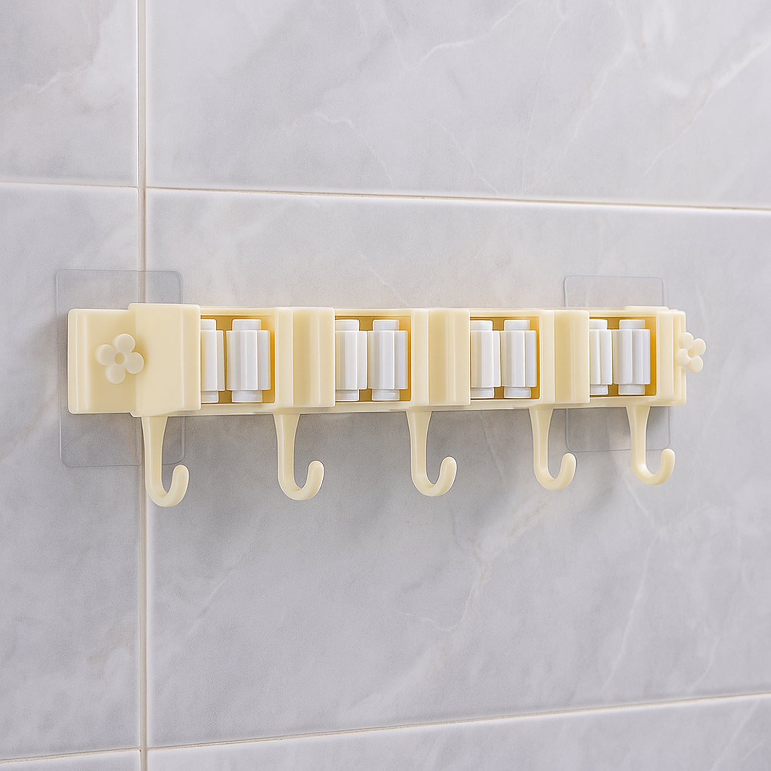Wukusy self-adhesive wall-mount broom and mop holder rack for organizing cleaning tools in home improvement spaces.