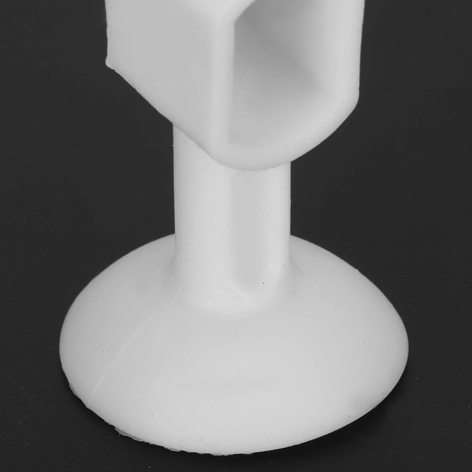 Wukusy self-sucking silicone door stopper in mixed colors, home improvement tool for securing doors with a sleek, flexible design.