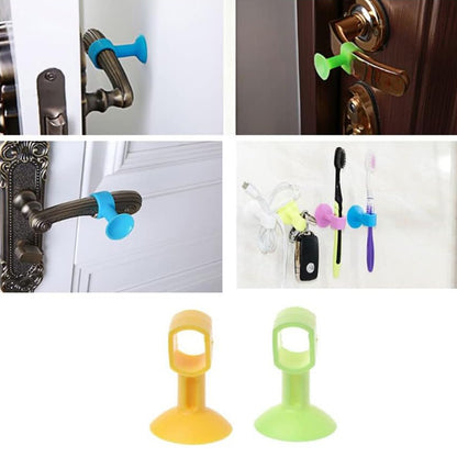 Set of two Wukusy self-sucking silicone door stoppers for home improvement, designed to hold doors securely in place.