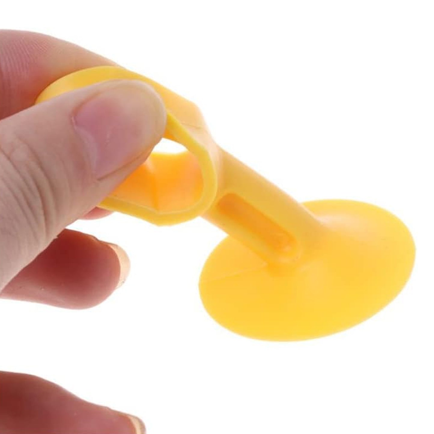 Set of two Wukusy self-sucking silicone door stoppers for home improvement, designed to hold doors securely in place.