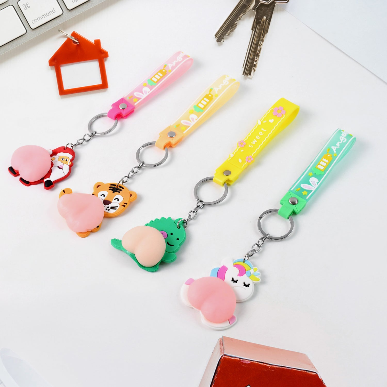 Wukusy silicone keychain with wrist strap squeeze toy in mixed designs, perfect for home improvement and everyday carry.