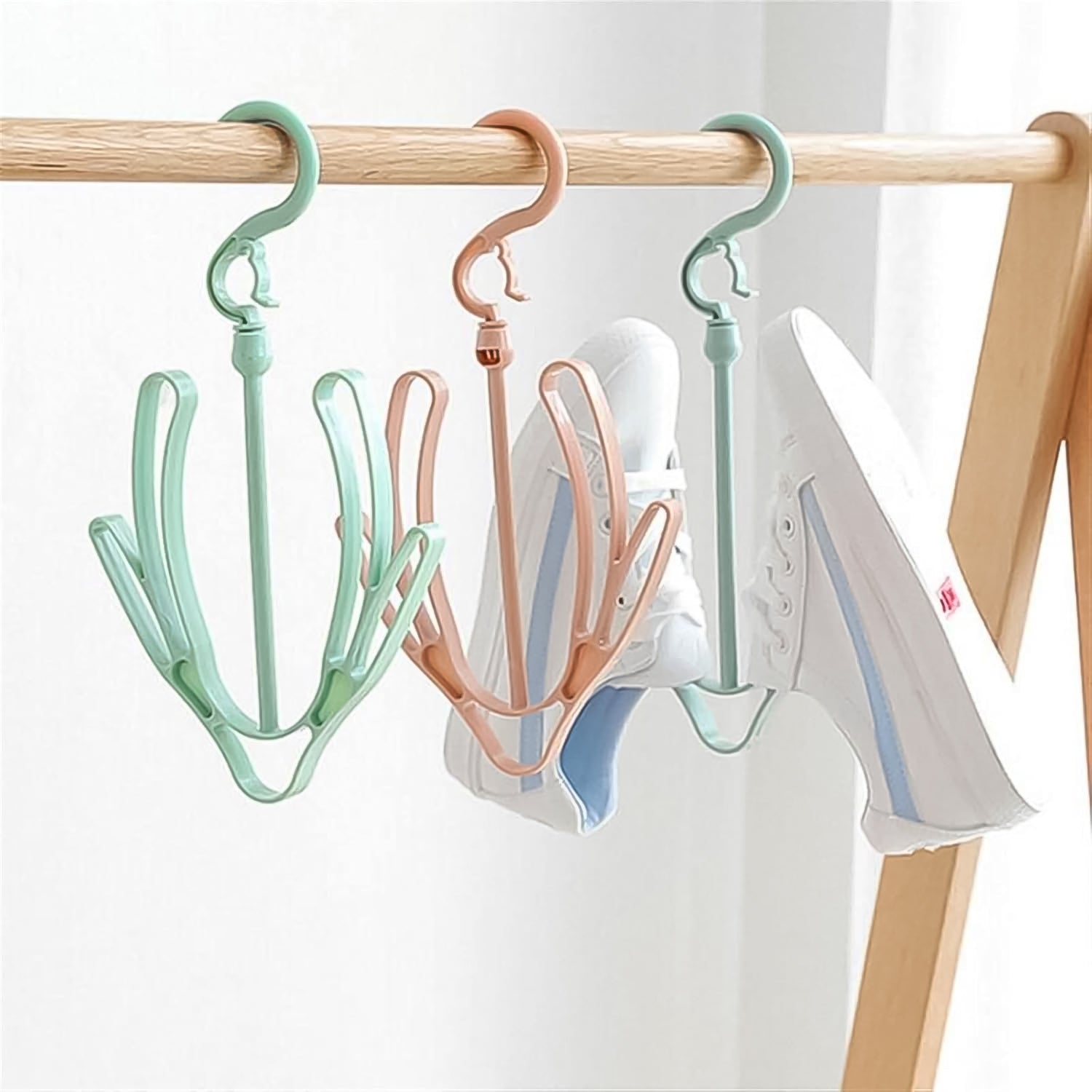 Wukusy small rotatable shoe drying hanger with multiple hooks for hanging and drying shoes, compact home improvement accessory.
