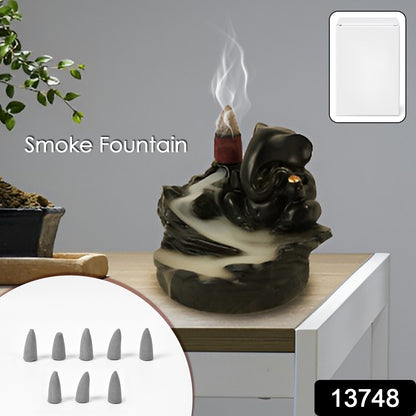Wukusy Ganesha idol home decor with smoke fountain feature and 8 backflow incense cones for aesthetic decoration.