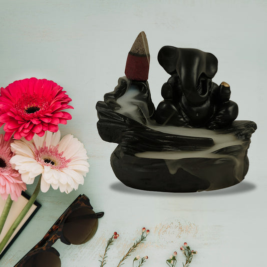 Wukusy Ganesha idol decoration with smoke fountain feature and 8 backflow incense cones for home improvement.