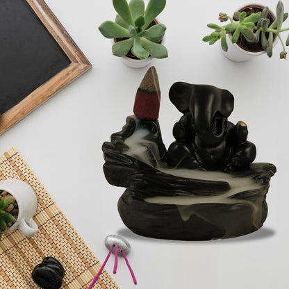 Wukusy Ganesha idol with smoke fountain decoration and 8-piece backflow incense cones for home improvement decor.