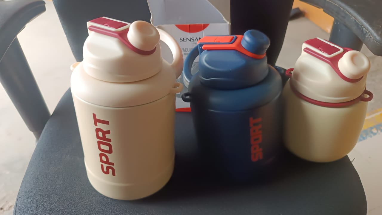 Wukusy sports vacuum bottle with shoulder strap, stylish mix design, ideal for outdoor activities and keeping beverages hot or cold.